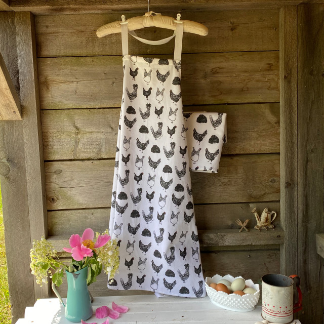 100% cotton, eco-friendly tea towel / kitchen towel and apron with fun, black and white chicken pattern 